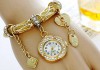 Фото Модные часы-браслет в стиле Pandora и серьги в подарок