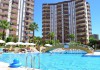 Фото Турция - Продается прекрасная трехкомнатная квартира в самом центре Махмутлара в 250 метрах от моря