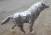 Волк скульптурный из металла.