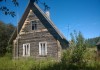 Фото Добротный зимний дом в тихой и уютной деревушке