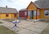 Фото Дом с удобствами, хорошим хозяйством и баней на въезде в посёлок