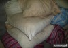 Фото Старые подушки пуховые перьевые перины одеяла