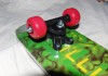 Фото Скейтборд деревянный Иллюзия 23” - яркая четырёхколёсная доска