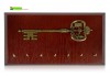 Фото Ключница настенная в виде панно с фигурой старинного ключа