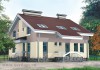 Фото Проект двухэтажного кирпичного дома с окнами на крыше.