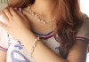 Фото Комплект Ожерелье серьги и браслет из речного жемчуга.