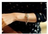 Фото Модный позолоченный браслет с камешками кубического циркония.