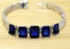 Фото Модный браслет с камнями сапфиров синего цвета.