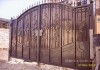 Ворота, зашитые листом металла m2 4мм. Заборы