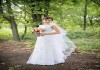 Фото Продам свадебное платье со шлейфом и подъюбником